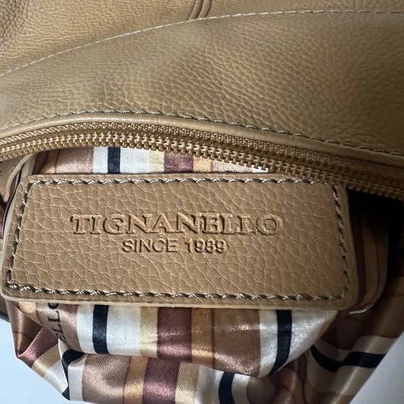 TIGNANELLO TAN LEATHER CROSSBODY BAG
9”x 8” STRIPED INTERIOR LINING - Picture 4 of 7